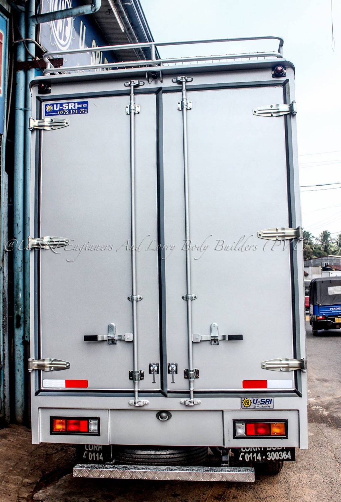 Plywood swing doors on a lorry body built by USRI Lorry Body Sri Lanka